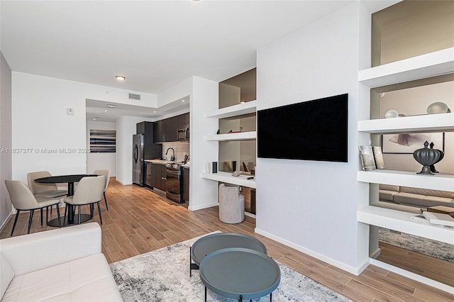 398 NE 5th St Unit 3711, Miami, FL 33132 - living area with light wood finished floors