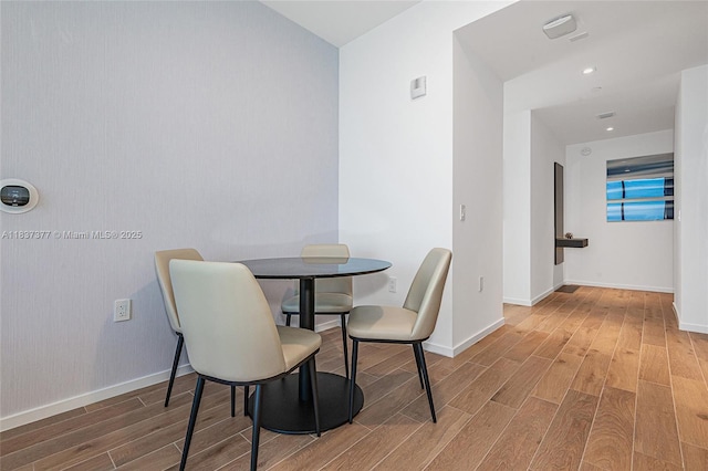 398 NE 5th St Unit 3711, Miami, FL 33132 - dining space with wood finished floors and baseboards