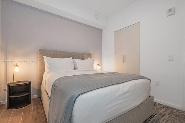 398 NE 5th St Unit 3711, Miami, FL 33132 - bedroom with wood finished floors and baseboards