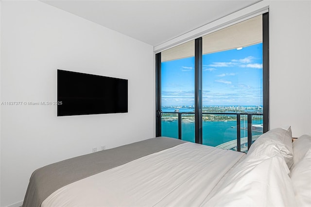 398 NE 5th St Unit 3711, Miami, FL 33132 - bedroom featuring a wall of windows