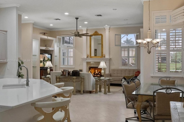 15595 Chandelle Pl, Wellington, FL 33414 - dining room featuring ornamental molding, a ceiling fan, a chandelier, light tile patterned floors, and recessed lighting
