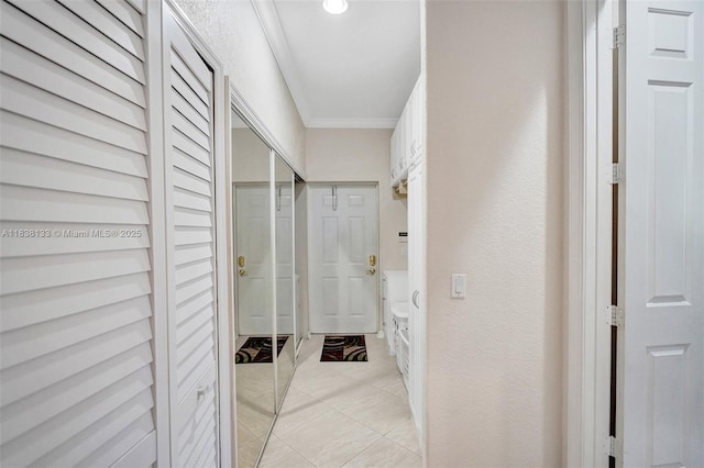 15595 Chandelle Pl, Wellington, FL 33414 - hallway with ornamental molding and light tile patterned floors