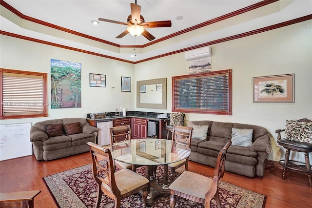 15595 Chandelle Pl, Wellington, FL 33414 - living area with crown molding, wood finished floors, a raised ceiling, ceiling fan, and a wall mounted AC