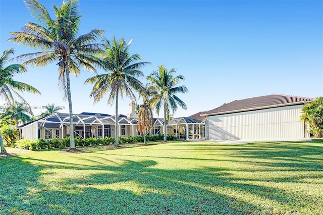 15595 Chandelle Pl, Wellington, FL 33414 - view of grassy yard featuring glass enclosure