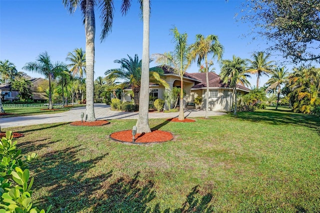 15595 Chandelle Pl, Wellington, FL 33414 - view of front of home featuring a front yard