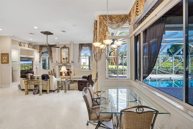 15595 Chandelle Pl, Wellington, FL 33414 - tiled dining room featuring a ceiling fan, ornamental molding, and recessed lighting