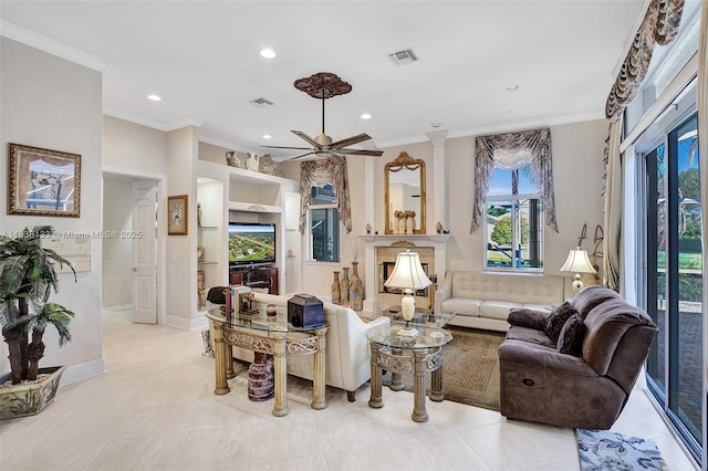 15595 Chandelle Pl, Wellington, FL 33414 - living room featuring ornamental molding, built in features, ceiling fan, recessed lighting, and light tile patterned floors