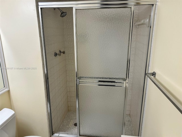 371 S Hollybrook Dr Unit 308, Pembroke Pines, FL 33025 - bathroom featuring toilet and a stall shower
