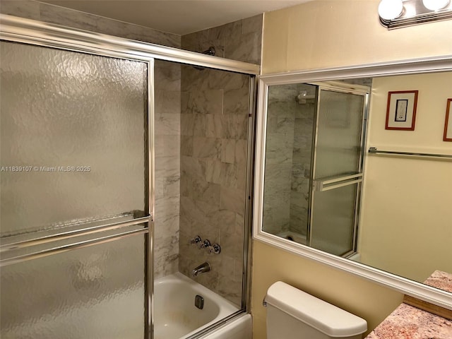 371 S Hollybrook Dr Unit 308, Pembroke Pines, FL 33025 - bathroom featuring bath / shower combo with glass door and toilet