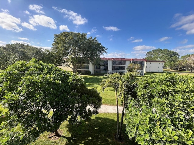 371 S Hollybrook Dr Unit 308, Pembroke Pines, FL 33025 - back of property featuring a lawn