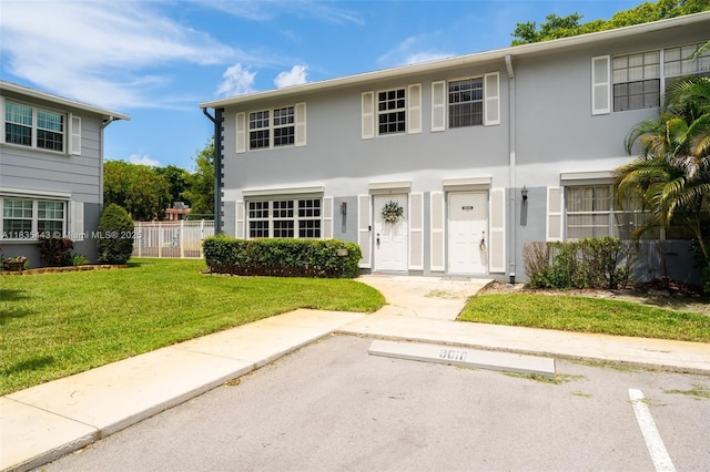 8010 SW 18th Ct Unit 1-8, Davie, FL 33324 - view of front of home with uncovered parking and stucco siding