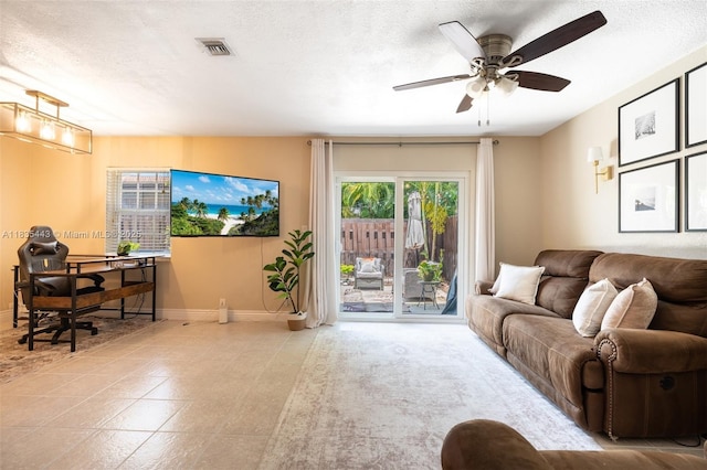 8010 SW 18th Ct Unit 1-8, Davie, FL 33324 - living room featuring a ceiling fan and a textured ceiling