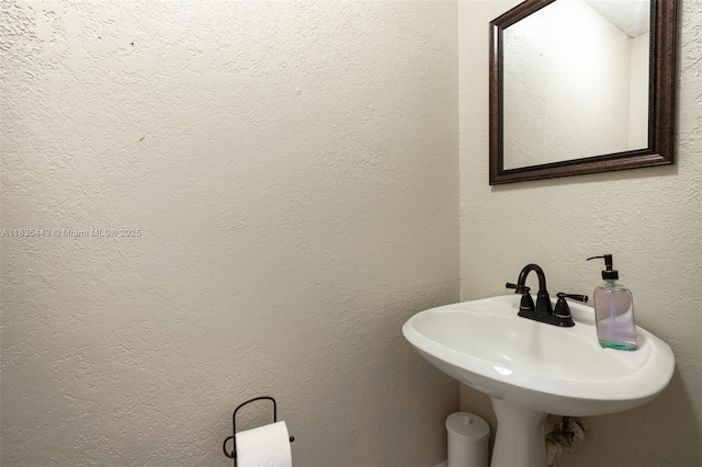 8010 SW 18th Ct Unit 1-8, Davie, FL 33324 - bathroom with a sink and a textured wall