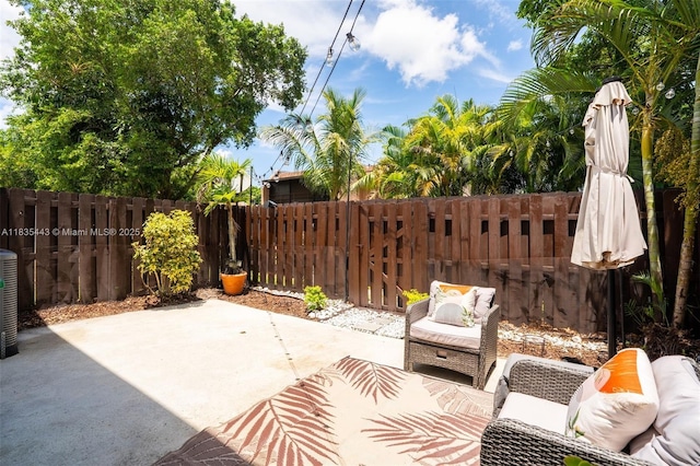 8010 SW 18th Ct Unit 1-8, Davie, FL 33324 - fenced backyard with a patio area and an outdoor hangout area