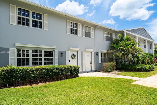 8010 SW 18th Ct Unit 1-8, Davie, FL 33324 - view of front of property with a front yard and stucco siding