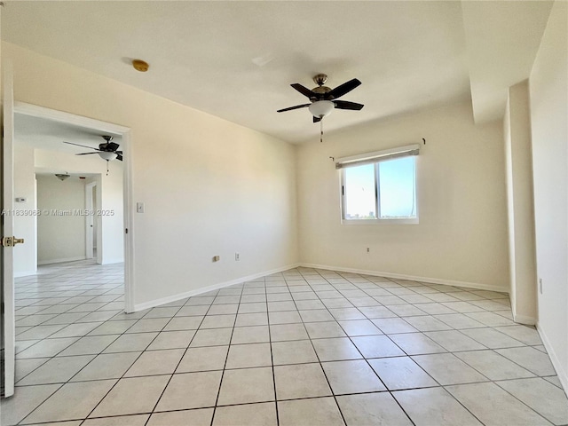 3500 Coral Way Unit 913, Miami, FL 33145 - unfurnished room featuring a ceiling fan, light tile patterned floors, and a smoke detector