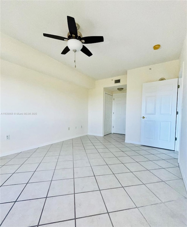 3500 Coral Way Unit 913, Miami, FL 33145 - spare room featuring ceiling fan and light tile patterned flooring