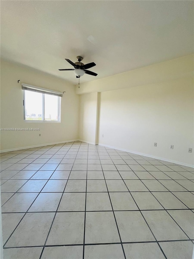 3500 Coral Way Unit 913, Miami, FL 33145 - spare room with light tile patterned floors and ceiling fan