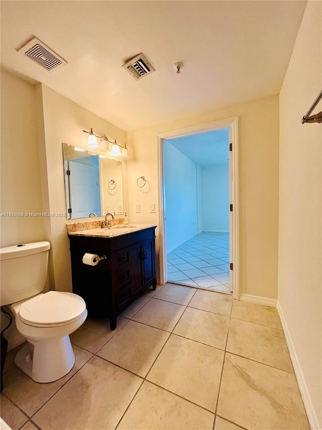 3500 Coral Way Unit 913, Miami, FL 33145 - bathroom with vanity and tile patterned flooring