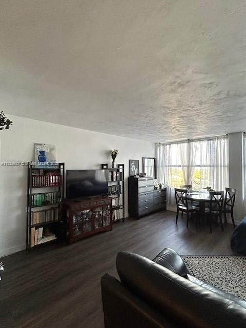 2899 Collins Ave Unit 1504, Miami Beach, FL 33140 - living room with wood finished floors and baseboards