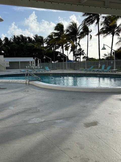 2899 Collins Ave Unit 1504, Miami Beach, FL 33140 - community pool with a patio