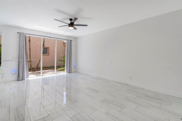 5050 Greenwich Preserve Ct, Boynton Beach, FL 33436 - empty room featuring ceiling fan and baseboards