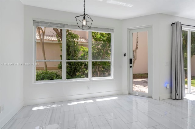 5050 Greenwich Preserve Ct, Boynton Beach, FL 33436 - unfurnished dining area featuring healthy amount of natural light