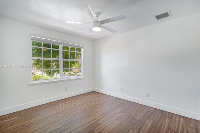 5050 Greenwich Preserve Ct, Boynton Beach, FL 33436 - empty room featuring dark wood-style floors and a ceiling fan