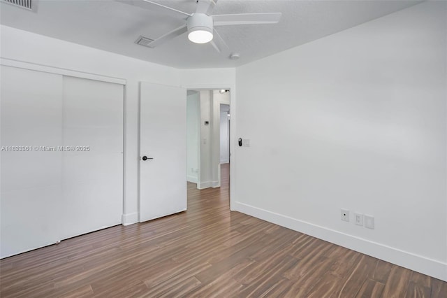 5050 Greenwich Preserve Ct, Boynton Beach, FL 33436 - unfurnished bedroom with wood finished floors, a closet, and ceiling fan
