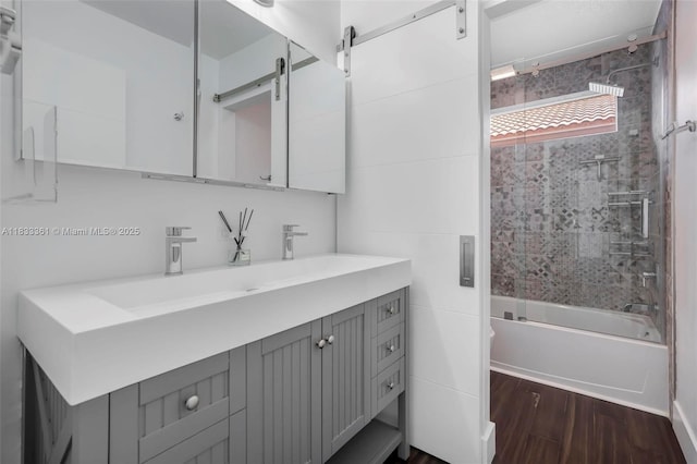 5050 Greenwich Preserve Ct, Boynton Beach, FL 33436 - bathroom featuring vanity, wood finished floors, and bathing tub / shower combination