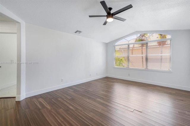 5050 Greenwich Preserve Ct, Boynton Beach, FL 33436 - empty room featuring lofted ceiling, a ceiling fan, and dark wood-style floors