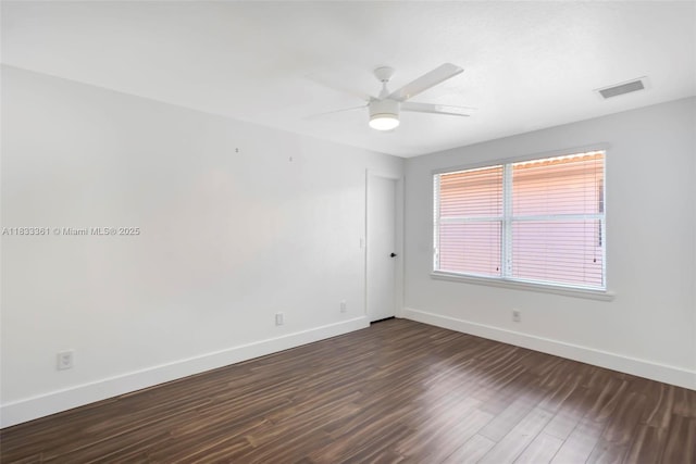 5050 Greenwich Preserve Ct, Boynton Beach, FL 33436 - unfurnished room featuring dark wood-style flooring and a ceiling fan