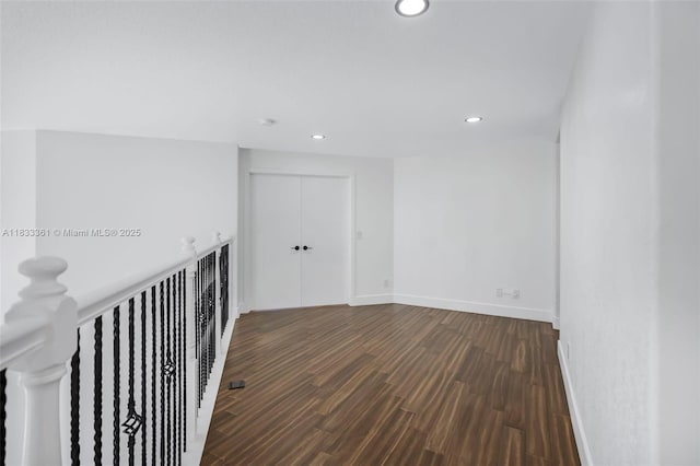 5050 Greenwich Preserve Ct, Boynton Beach, FL 33436 - corridor with recessed lighting, dark wood finished floors, and an upstairs landing