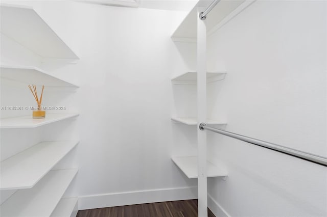 5050 Greenwich Preserve Ct, Boynton Beach, FL 33436 - spacious closet with dark wood finished floors
