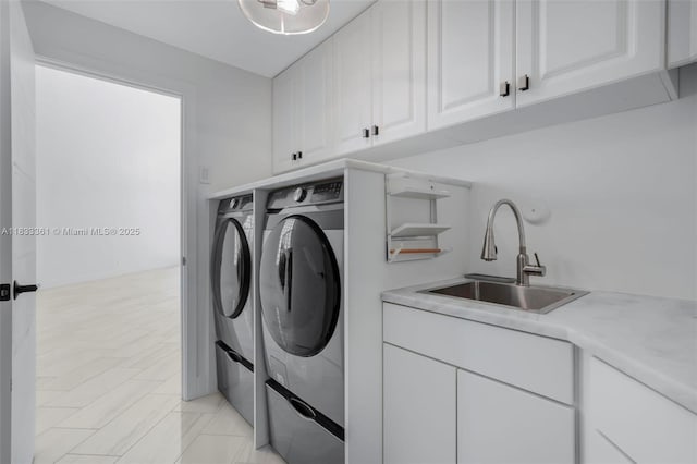 5050 Greenwich Preserve Ct, Boynton Beach, FL 33436 - laundry room with washer and clothes dryer and cabinet space