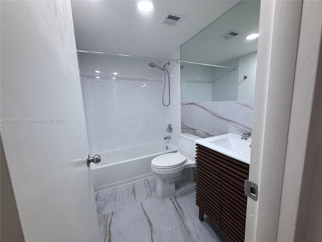 1440 Brickell Bay Dr Unit 307, Miami, FL 33131 - bathroom featuring bathing tub / shower combination, marble look tile flooring, vanity, and recessed lighting