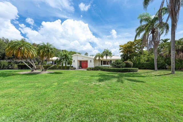 6957 SW 148th Ter, Palmetto Bay, FL 33158 - view of green lawn with a garage