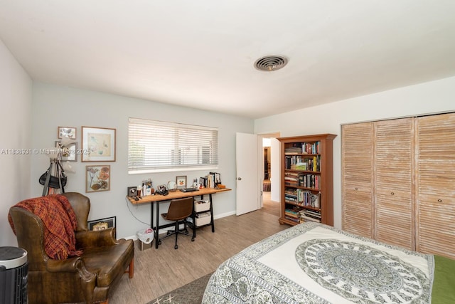 6957 SW 148th Ter, Palmetto Bay, FL 33158 - bedroom with wood finished floors and a closet