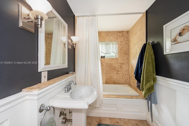 6957 SW 148th Ter, Palmetto Bay, FL 33158 - bathroom featuring shower / bath combo and wainscoting