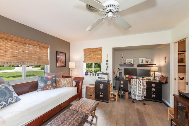 6957 SW 148th Ter, Palmetto Bay, FL 33158 - bedroom featuring an office area, wood finished floors, and ceiling fan