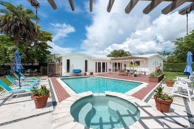 6957 SW 148th Ter, Palmetto Bay, FL 33158 - view of pool with french doors, a pool with connected hot tub, and a patio