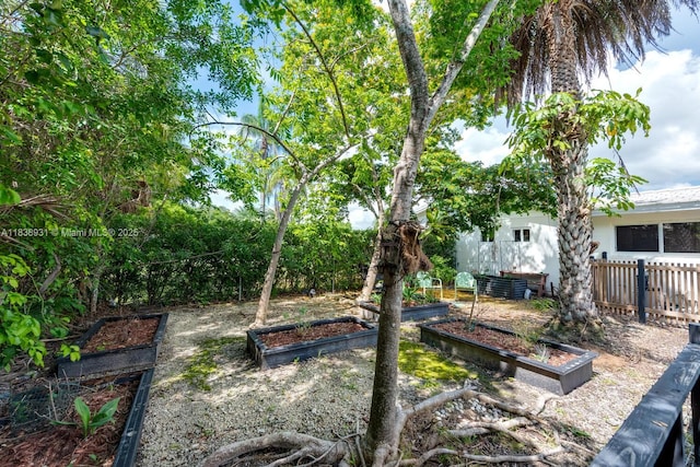 6957 SW 148th Ter, Palmetto Bay, FL 33158 - view of yard with a garden