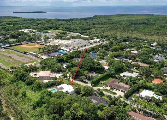 6957 SW 148th Ter, Palmetto Bay, FL 33158 - aerial overview of property's location featuring a forest and a nearby body of water