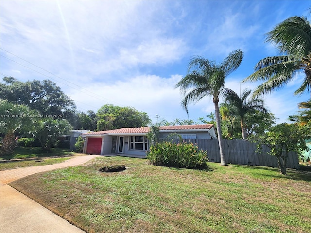 2451 SW 16th St, Fort Lauderdale, FL 33312 - view of front of house featuring driveway and a garage