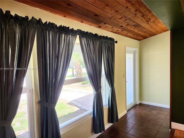 2451 SW 16th St, Fort Lauderdale, FL 33312 - interior space with wood ceiling and dark tile patterned flooring