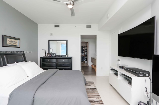 2900 NE 7th Ave Unit 404, Miami, FL 33137 - bedroom with a ceiling fan, a spacious closet, and light wood-style flooring