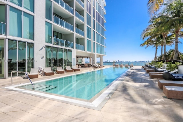 2900 NE 7th Ave Unit 404, Miami, FL 33137 - community pool with a patio area and a water view