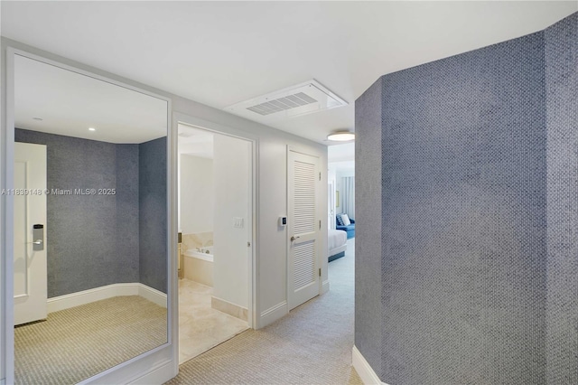 4401 Collins Ave Unit 2305, Miami Beach, FL 33140 - hallway featuring carpet flooring and baseboards