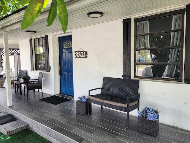 3521 E 8th Ave, Hialeah, FL 33013 - entrance to property featuring covered porch and stucco siding