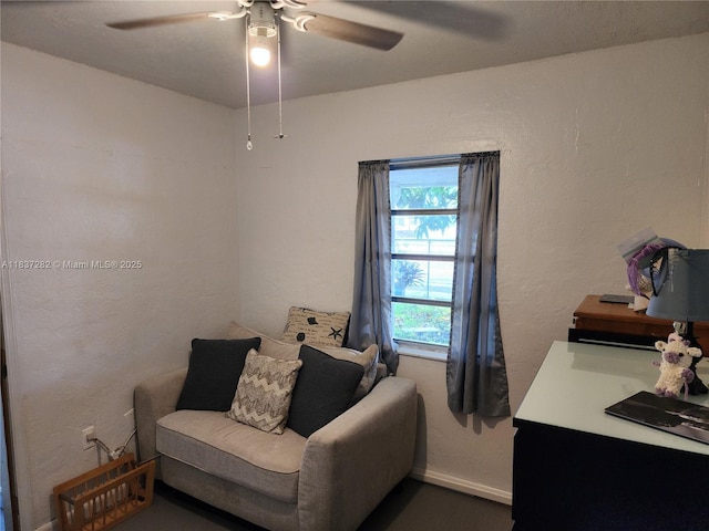 3521 E 8th Ave, Hialeah, FL 33013 - living area with ceiling fan and baseboards